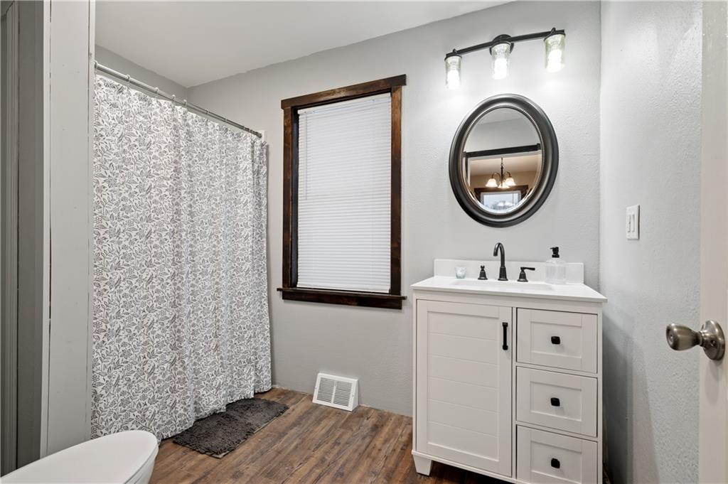 1575 Windows Road Smicksburg, PA 16256 - Photo 27 of 35 a bathroom with a sink a toilet and a mirror