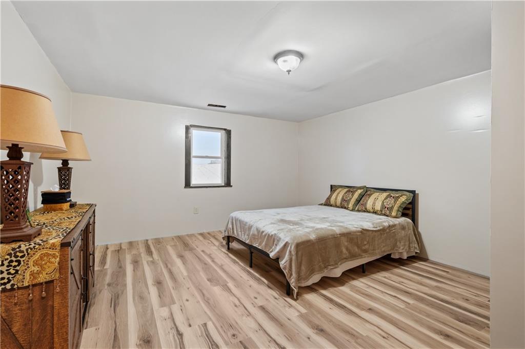 1575 Windows Road Smicksburg, PA 16256 - Photo 28 of 35 a bedroom with a bed and a flat screen tv