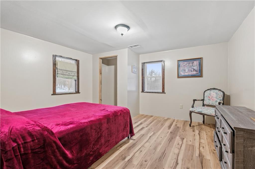 1575 Windows Road Smicksburg, PA 16256 - Photo 29 of 35 a bedroom with a large bed and a window