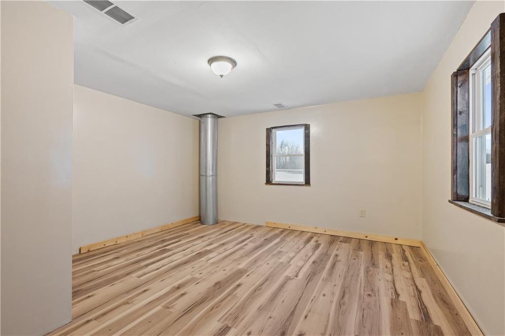1575 Windows Road Smicksburg, PA 16256 - Photo 32 of 35 a view of a room with wooden floor and a window