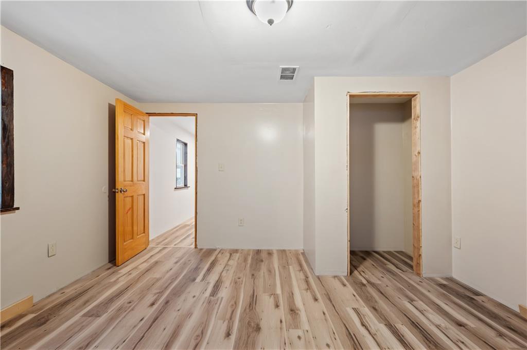 1575 Windows Road Smicksburg, PA 16256 - Photo 33 of 35 a view of a room with wooden floor and bathroom