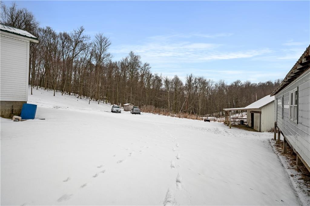 1575 Windows Road Smicksburg, PA 16256 - Photo 7 of 35 a view of a road with a snow on the road