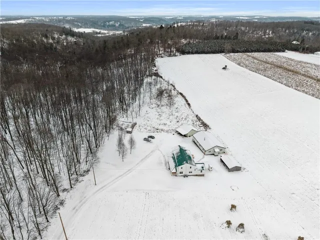a view of roof with city view
