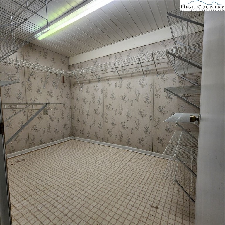 336 Willowdale Church Road Vilas, NC 28692 - Photo 16 of 35 a bathroom with a shower