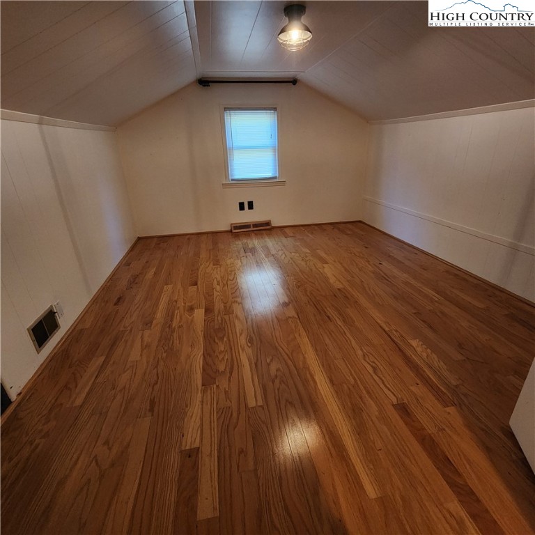 336 Willowdale Church Road Vilas, NC 28692 - Photo 19 of 35 a view of empty room with wooden floor