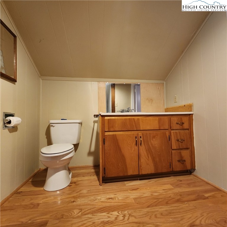 336 Willowdale Church Road Vilas, NC 28692 - Photo 20 of 35 a bathroom with a toilet and a sink
