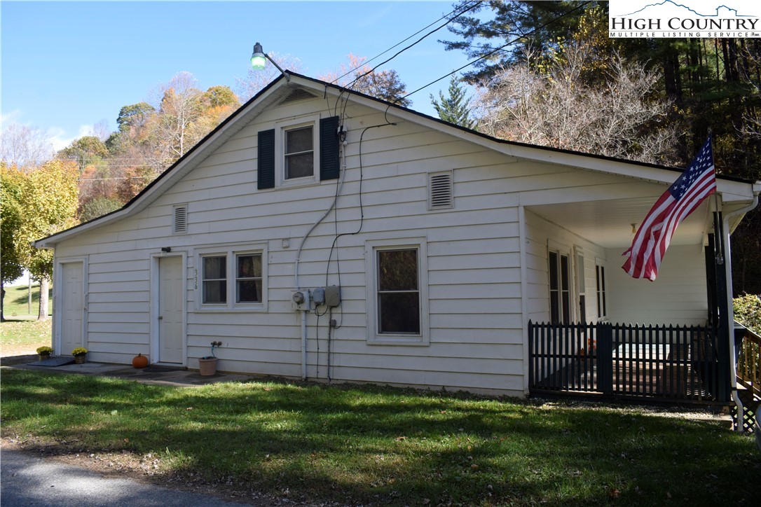 336 Willowdale Church Road Vilas, NC 28692 - Photo 2 of 35 a front view of a house with a yard