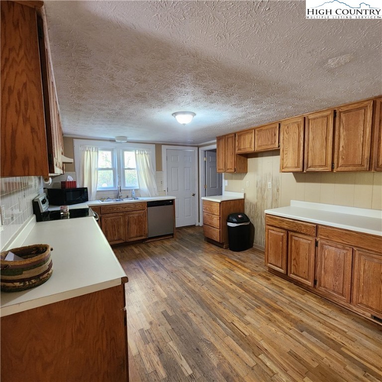 336 Willowdale Church Road Vilas, NC 28692 - Photo 9 of 35 a kitchen with sink and cabinets