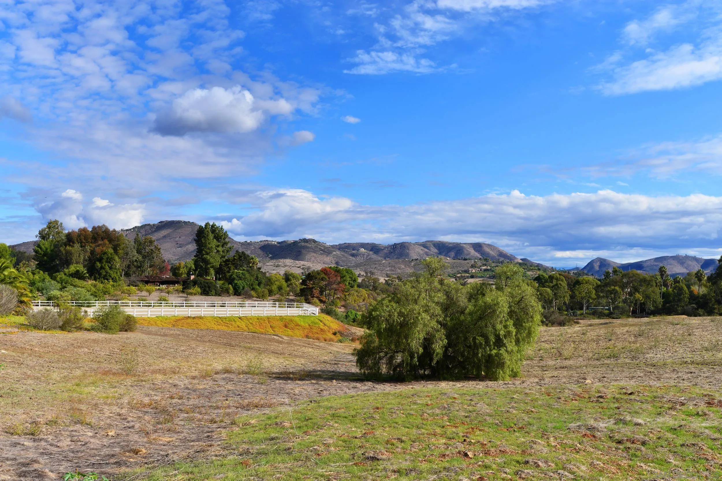 6710 El Montevideo Rancho Santa Fe, CA 92067 - Photo 4 of 9 a view of a lake with a mountain