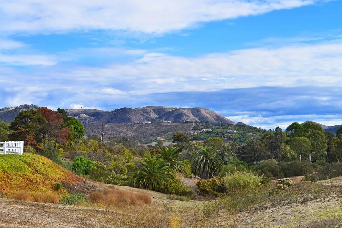 6710 El Montevideo Rancho Santa Fe, CA 92067 - Photo 7 of 9 a view of a city with mountains in the background
