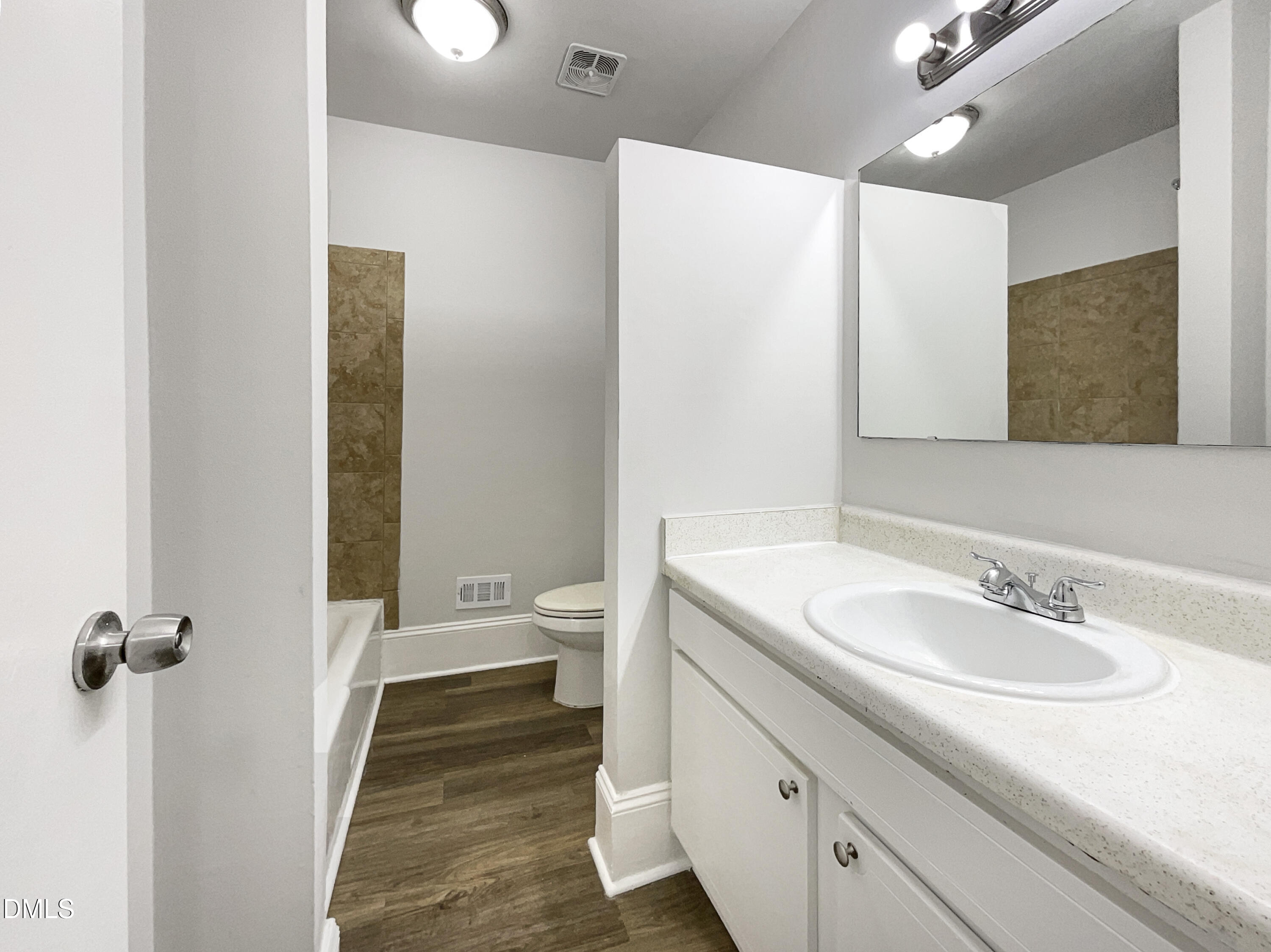 3737 Jamestown Circle Raleigh, NC 27609 - Photo 11 of 14 a bathroom with a sink and a mirror
