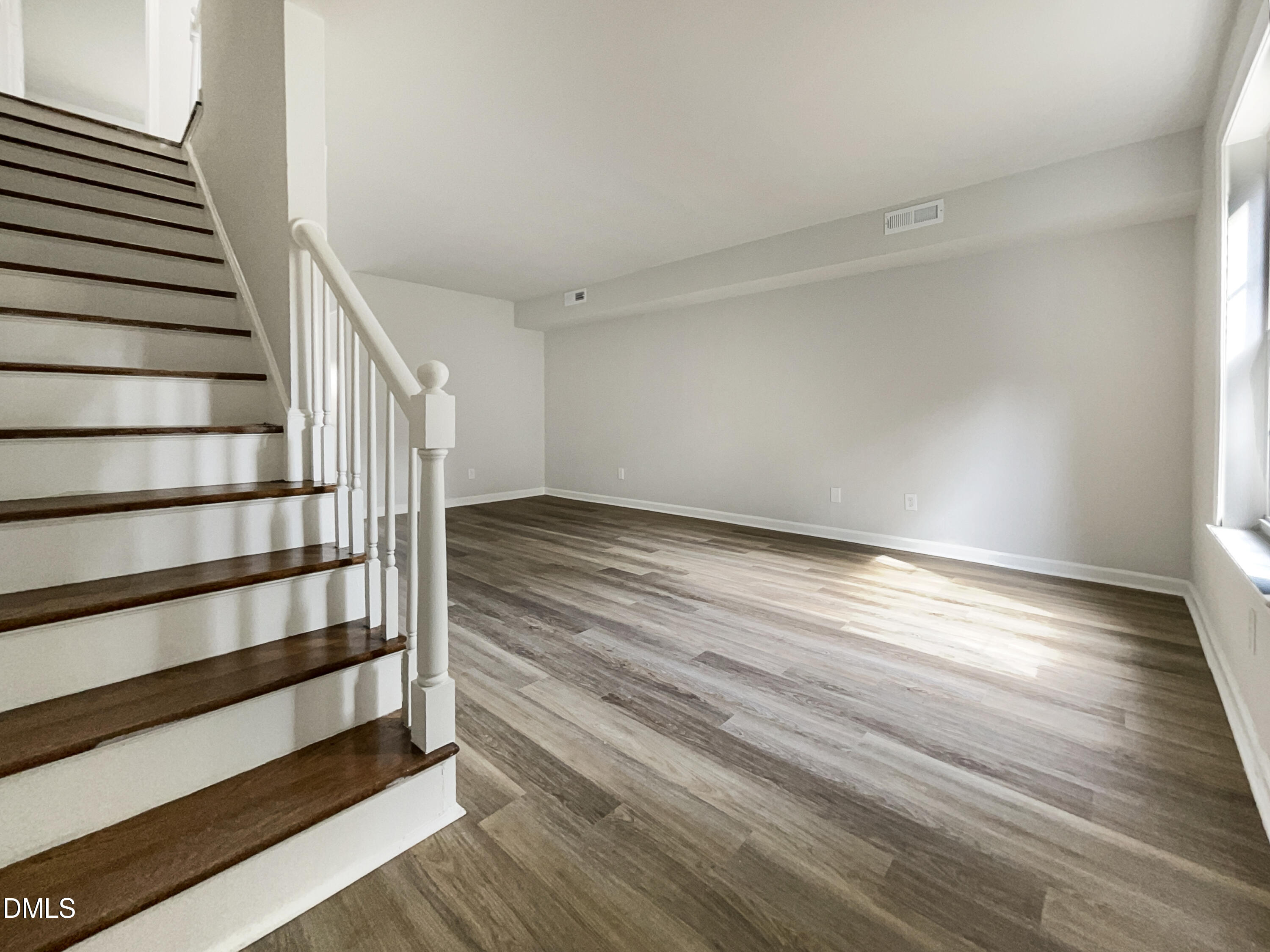 3737 Jamestown Circle Raleigh, NC 27609 - Photo 7 of 14 a view of entryway with wooden floor
