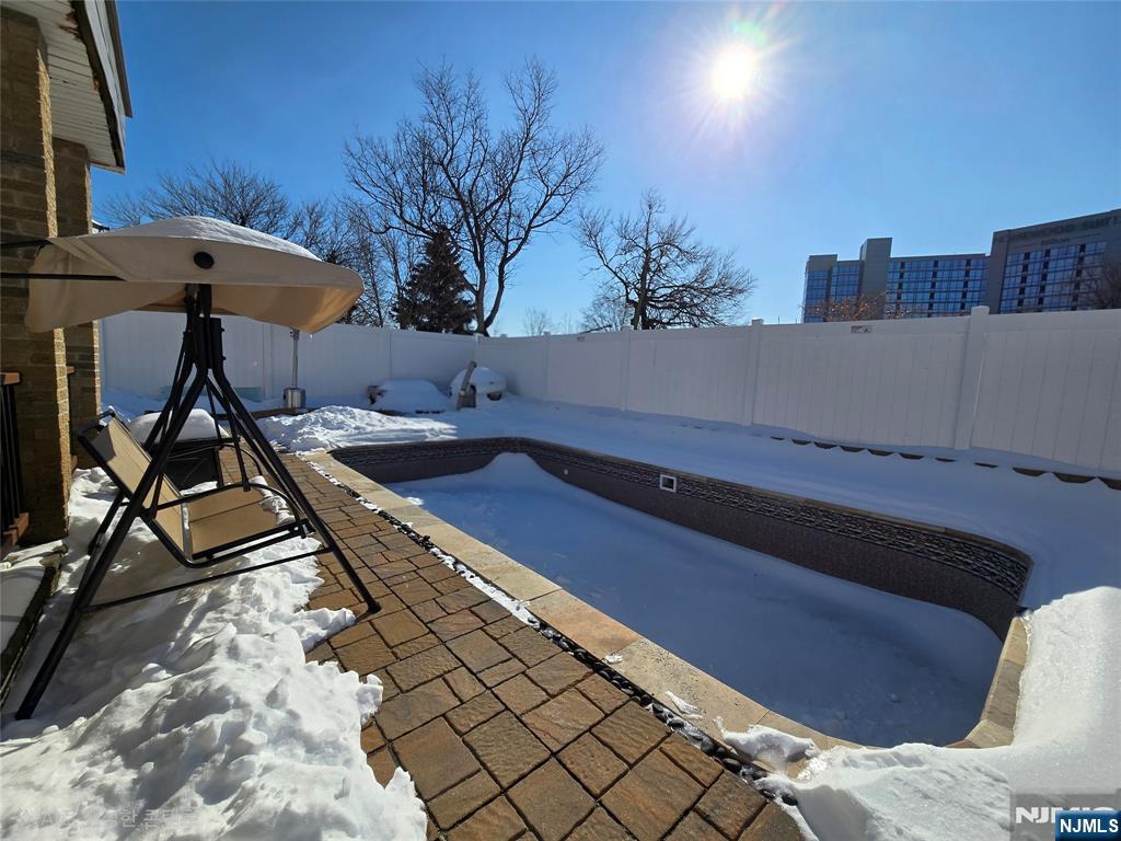 282 Harding Avenue, Unit 1 Teaneck, NJ 07666 - Photo 20 of 21 a view of a terrace with chairs