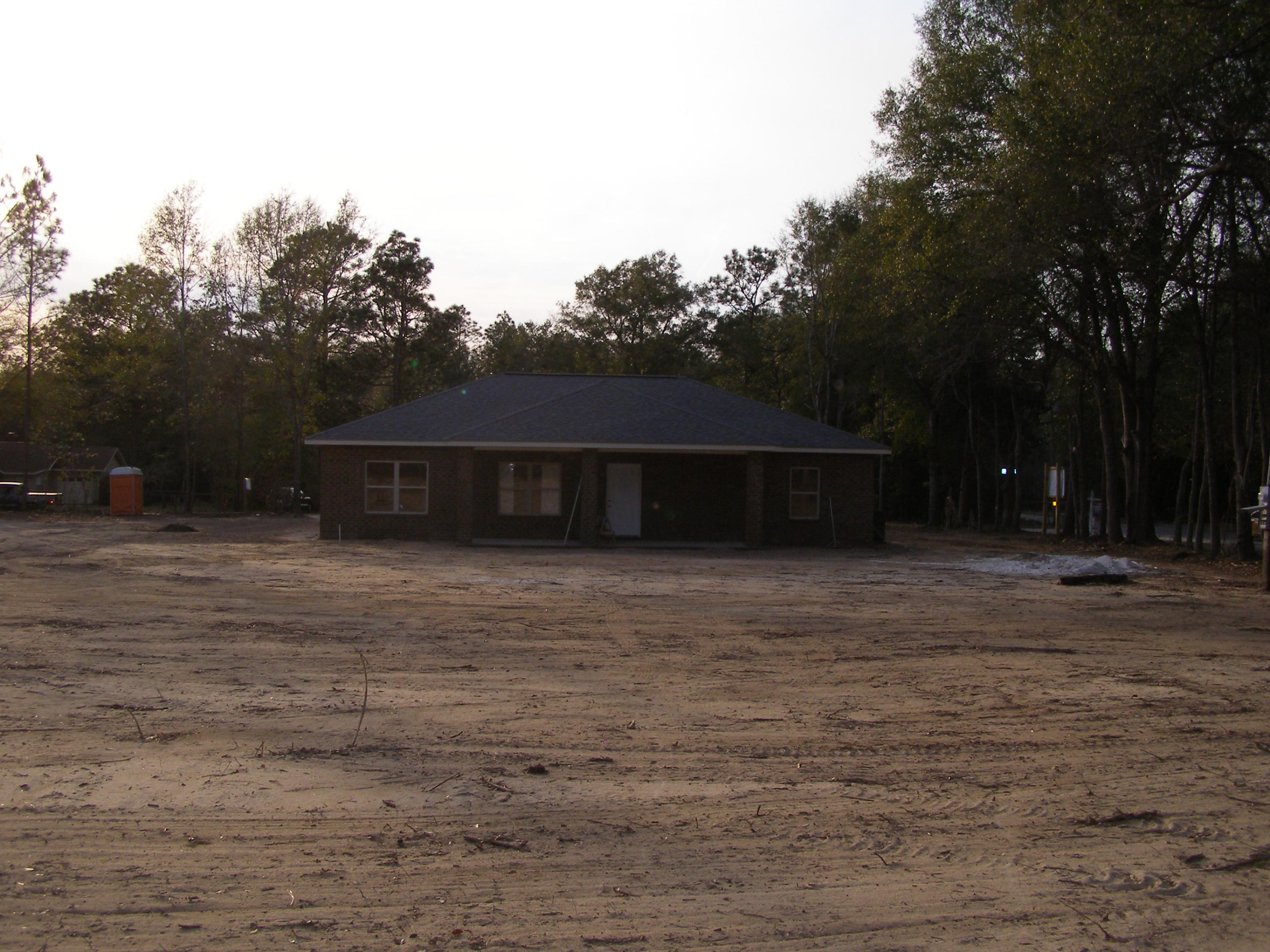 771 Ridge Lake Road Crestview, FL 32536 - Photo 18 of 19 a front view of a house with a yard