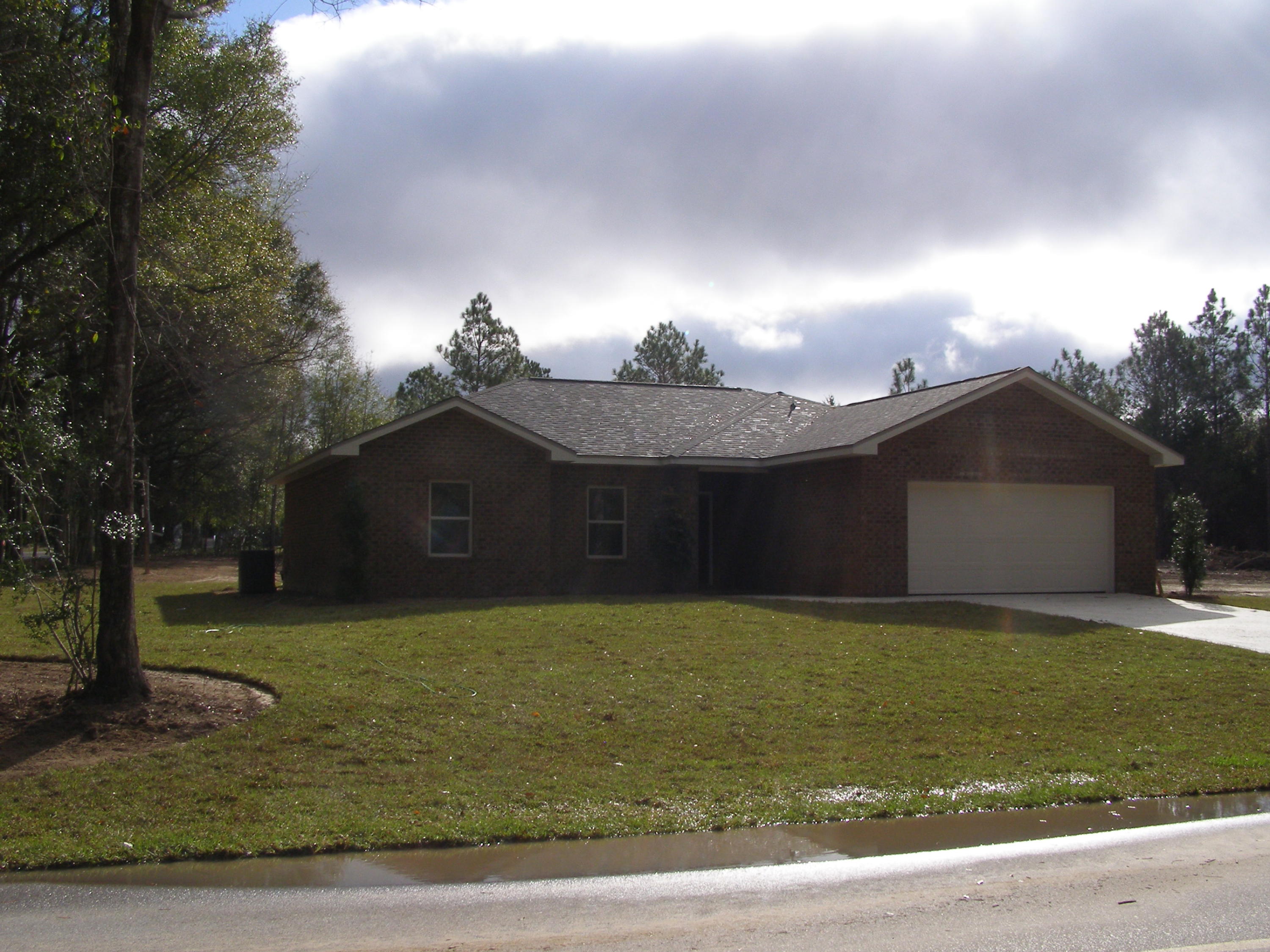 771 Ridge Lake Road Crestview, FL 32536 - Photo 7 of 19 a view of a yard in front of a house with a yard