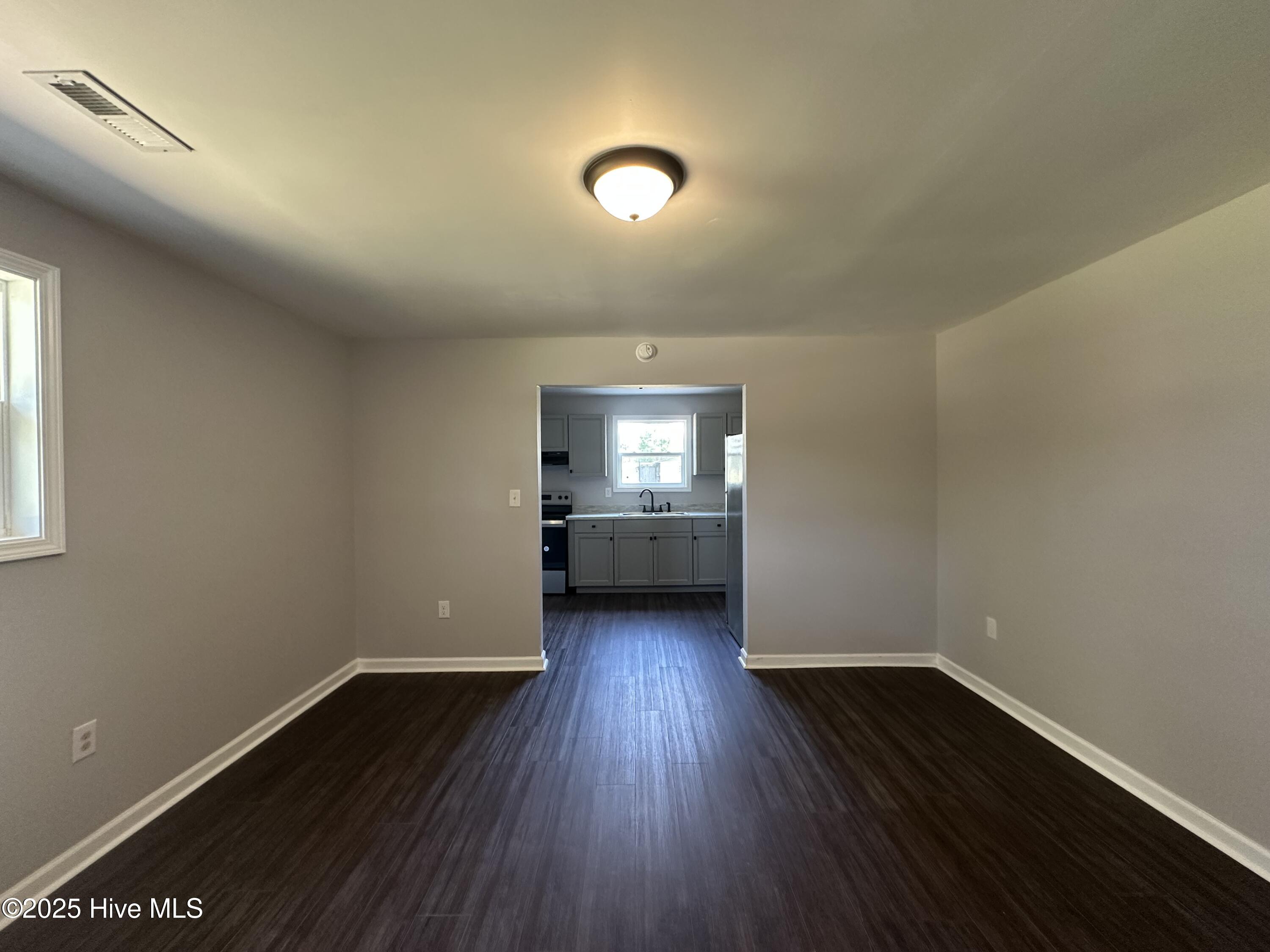 201 Morning Road Windsor, NC 27983 - Photo 4 of 22 Living room into Kichen
