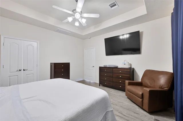 a bedroom with a bed and furniture