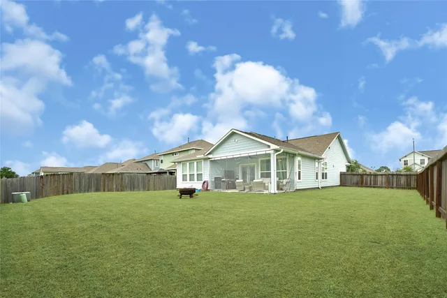 a front view of a house with a garden and porch