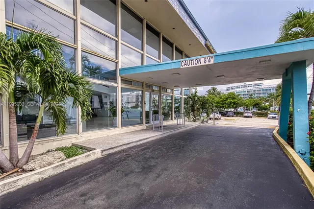 a view of a building with a tree