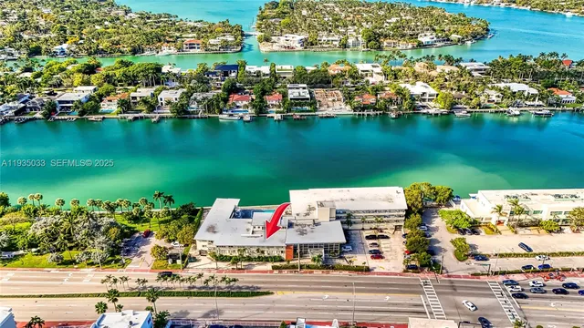 an aerial view of a houses with outdoor space