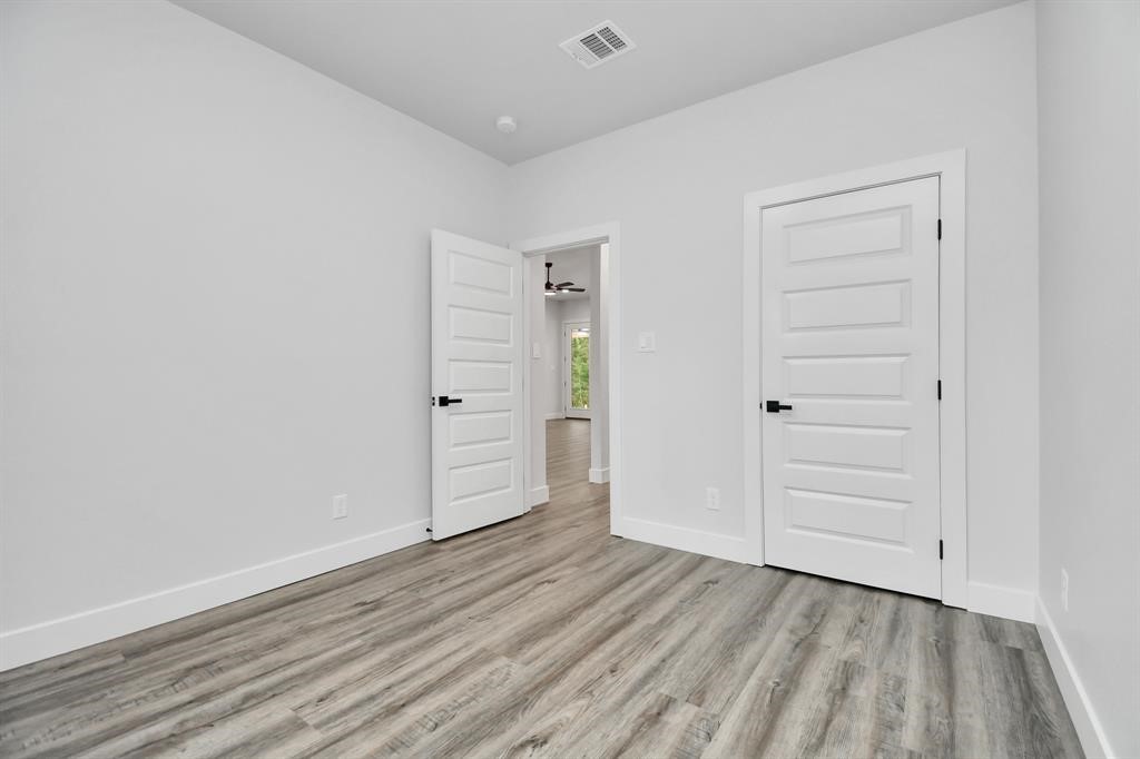 12163 La Salle River Road Conroe, TX 77304 - Photo 12 of 27 wooden floor and closet in a room