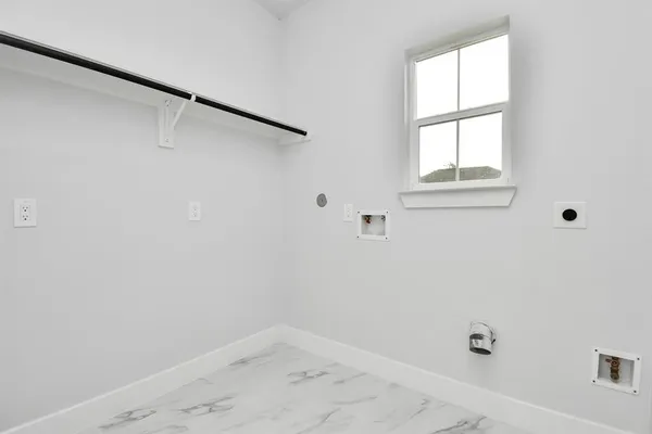 a view of small space with racks on the wall