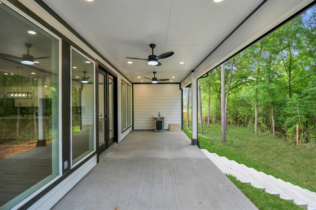 12163 La Salle River Road Conroe, TX 77304 - Photo 24 of 27 a view of a porch