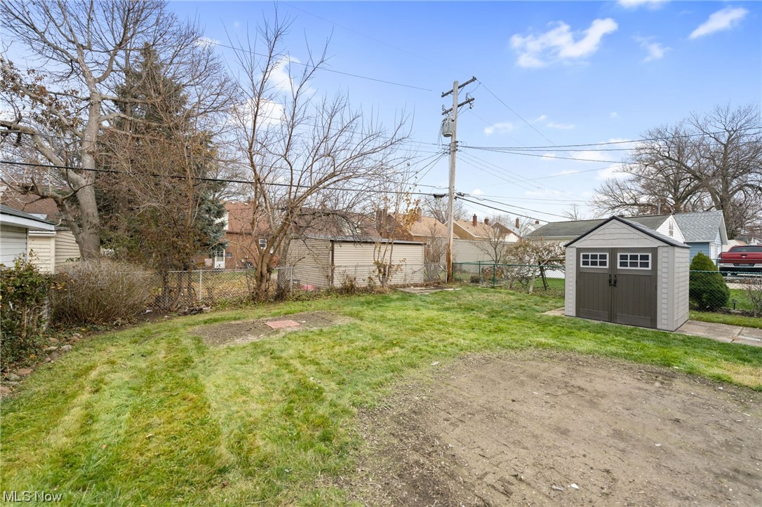 3561 Warren Road Cleveland, OH 44111 - Photo 27 of 28 View of yard featuring a storage unit