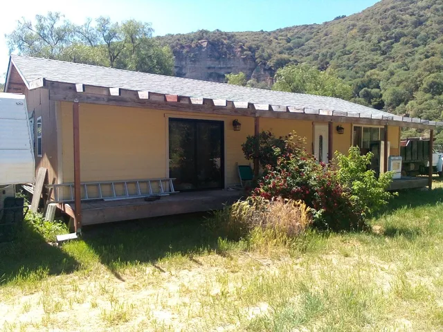 a view of a house with a swimming pool