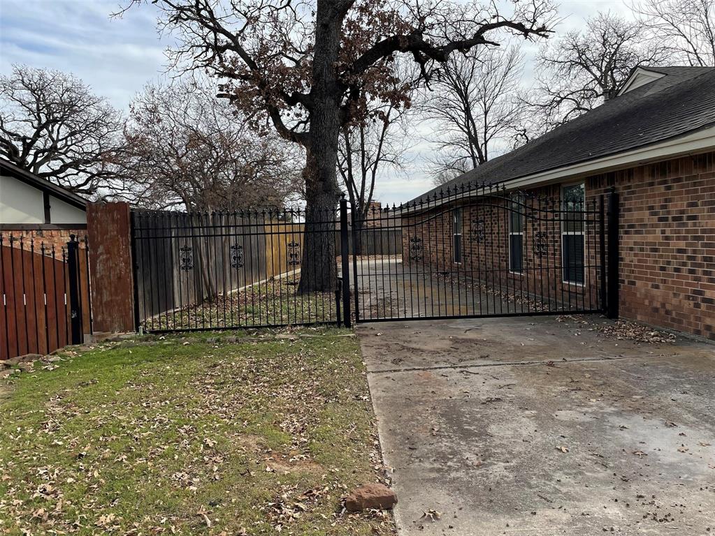 2109 Oakmeadow Street Bedford, TX 76021 - Photo 30 of 31 View of gate