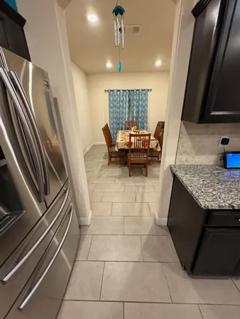 a large kitchen with lots of counter space and appliances