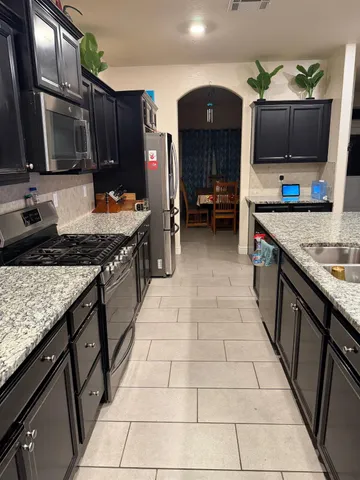 a view of sitting area in front of a door