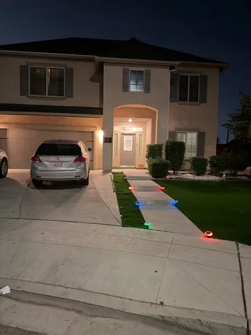 a car parked in front of a house
