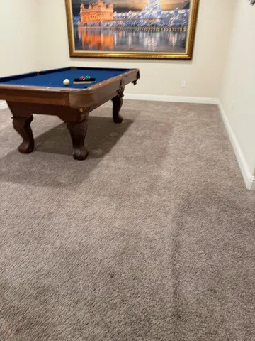 a view of backyard with outdoor seating and green space