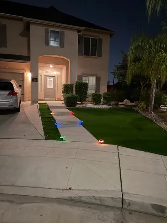 a view of a back yard of the house