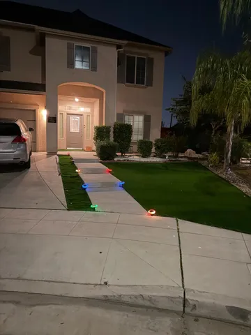 a view of a back yard of the house