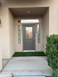 a room with furniture and mirror