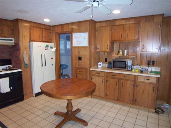 2-4 Evergreen Avenue Newton, MA 02466 - Photo 14 of 23 a kitchen with stainless steel appliances a sink cabinets and wooden floor