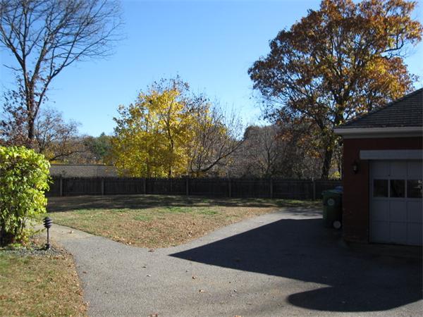 2-4 Evergreen Avenue Newton, MA 02466 - Photo 21 of 23 a view of a backyard with large trees