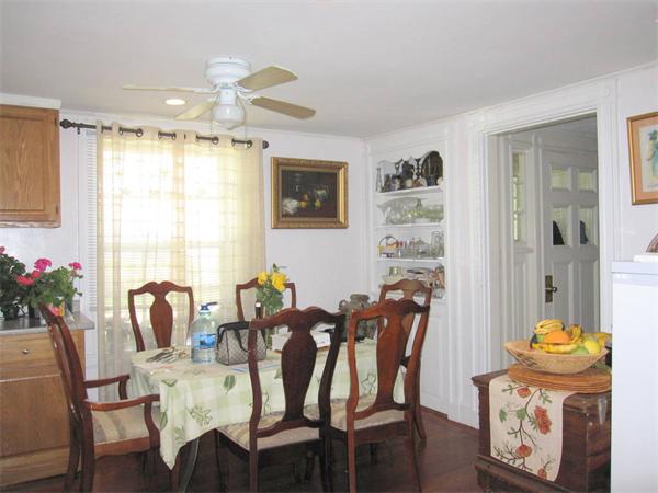 2-4 Evergreen Avenue Newton, MA 02466 - Photo 3 of 23 a dining room with furniture and window