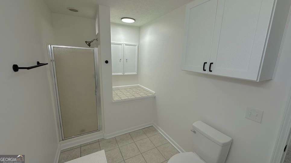 2095 4 Notch Road Carrollton, GA 30116 - Photo 23 of 53 a bathroom with a shower and toilet