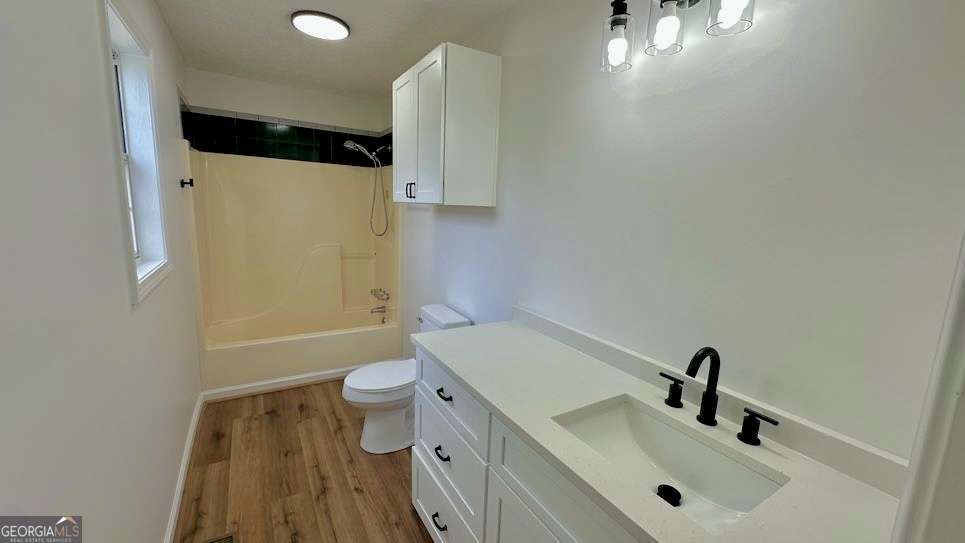 2095 4 Notch Road Carrollton, GA 30116 - Photo 30 of 53 a bathroom with a sink a toilet and shower