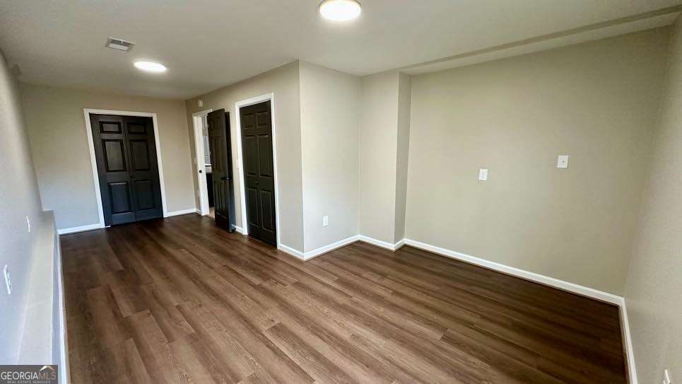 2095 4 Notch Road Carrollton, GA 30116 - Photo 35 of 53 a view of an empty room with wooden floor