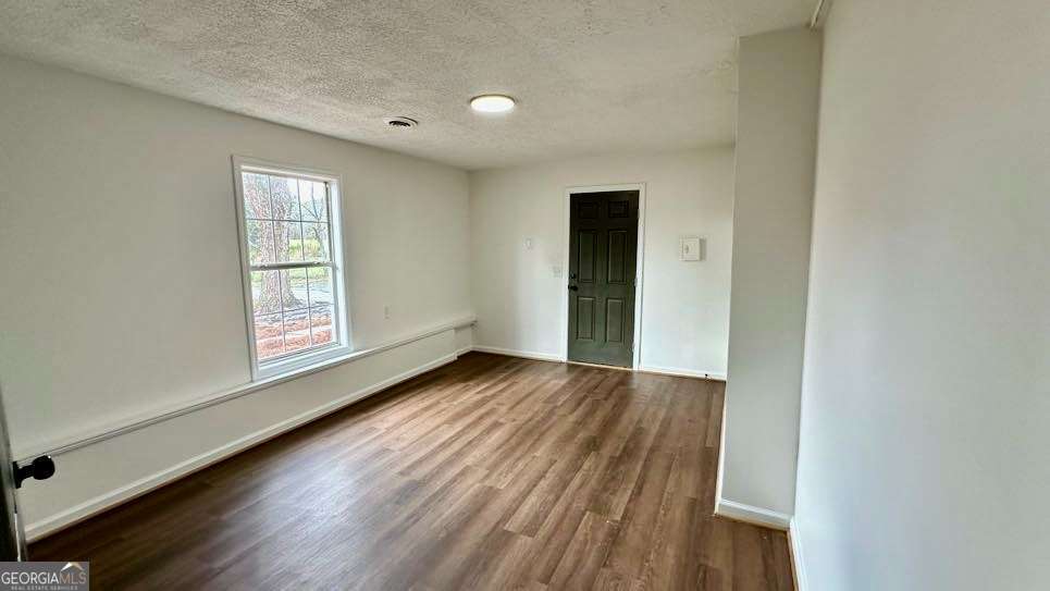 2095 4 Notch Road Carrollton, GA 30116 - Photo 40 of 53 a view of an empty room and window