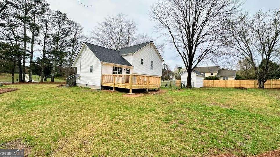 2095 4 Notch Road Carrollton, GA 30116 - Photo 43 of 53 a white house that has a tree in front of a house