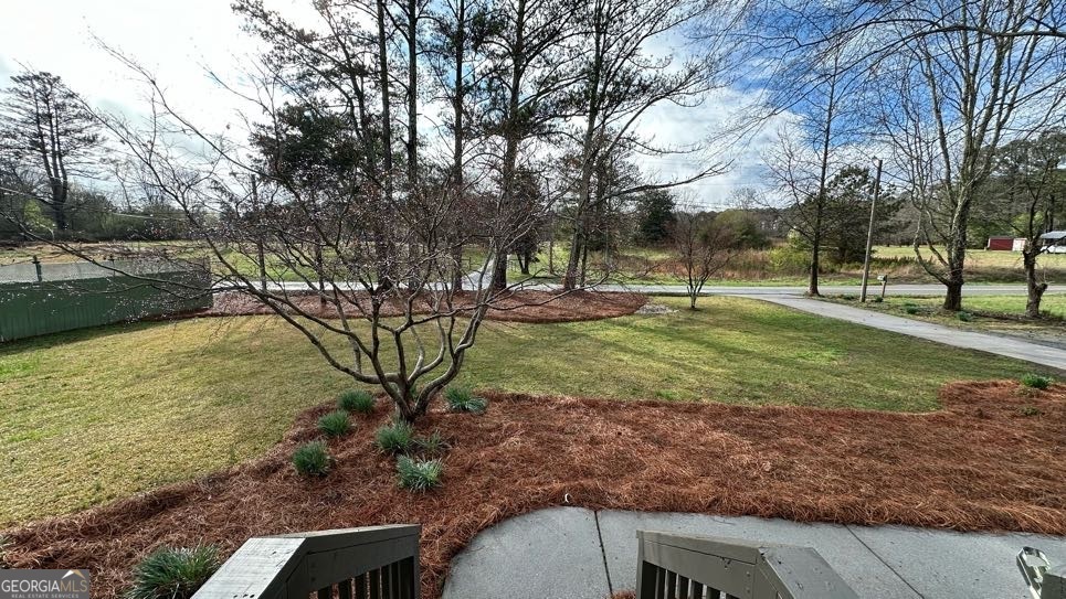 2095 4 Notch Road Carrollton, GA 30116 - Photo 9 of 53 a view of a yard with a tree