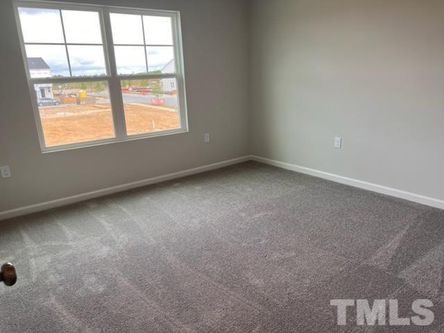 2403 Chert Lane, Unit 2403 Raleigh, NC 27610 - Photo 9 of 19 an empty room with a window