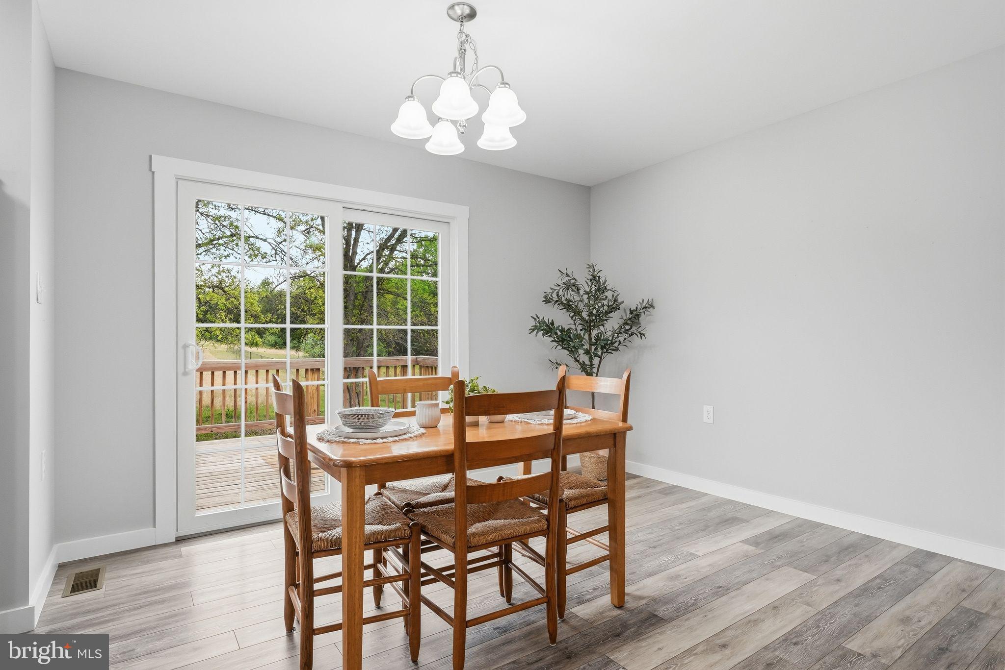 14006 Rixeyville Road Culpeper, VA 22701 - Photo 12 of 36 Bright dining space with outdoor view.