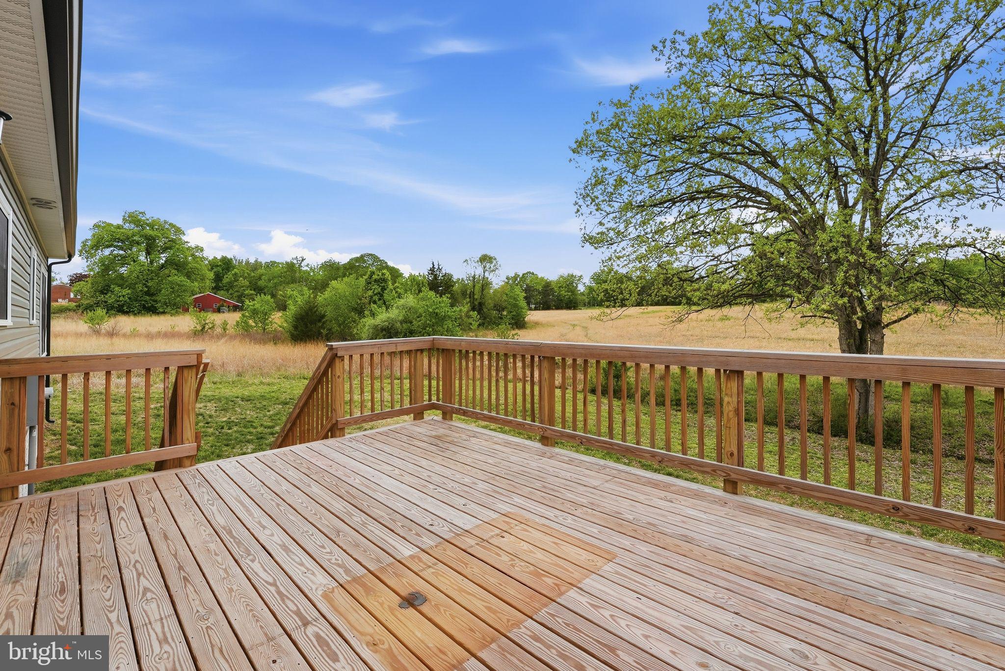 14006 Rixeyville Road Culpeper, VA 22701 - Photo 30 of 36 Serene deck with scenic countryside views.