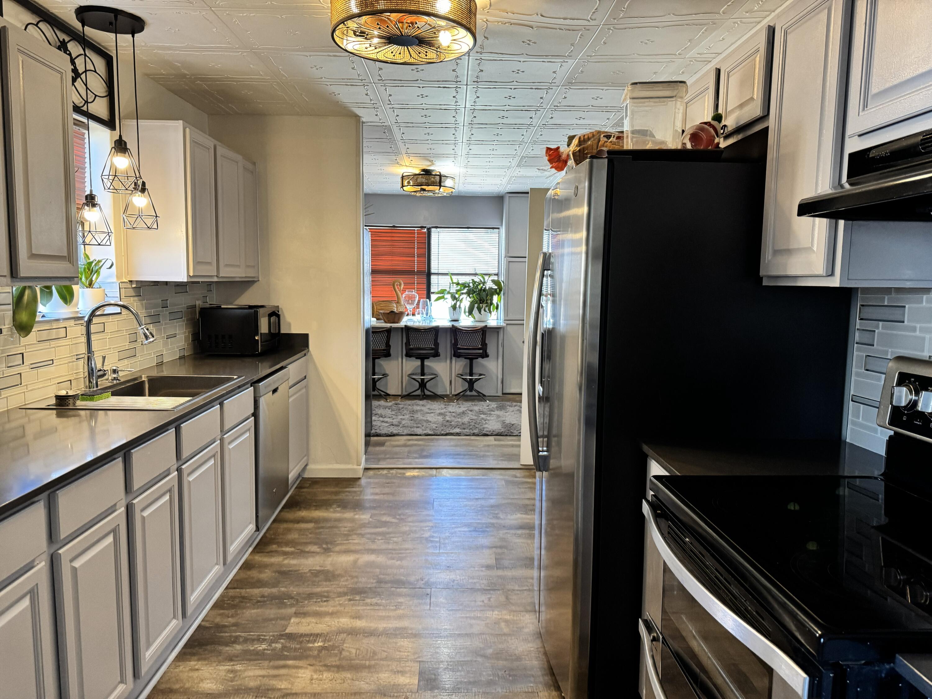 2864 Sixth Street Florala, AL 36442 - Photo 12 of 28 a kitchen with stainless steel appliances a refrigerator and a stove